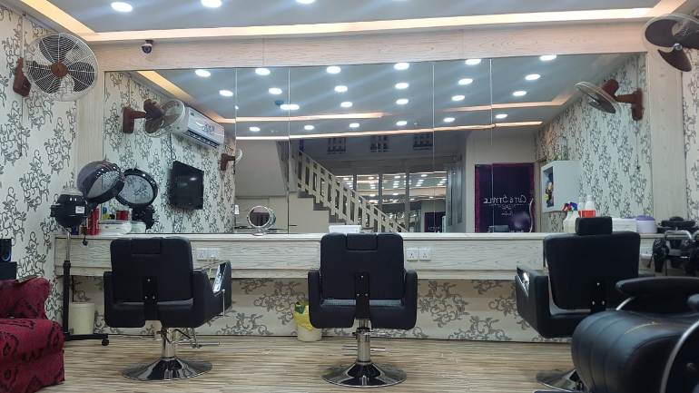 Root Touching + Hair Cut + Skin Polisher + Eyebrows Threading by Cut & Style Ladies Salon, Commercial Area, Phase 1, DHA, Lahore