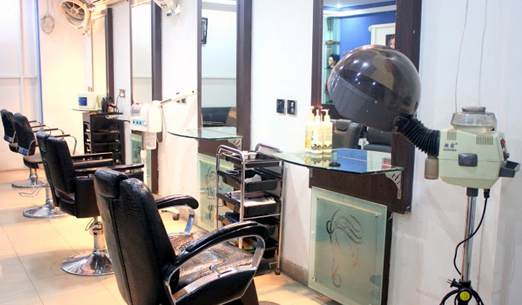 Party Makeup & Hairstyle + Blow Dry OR Hair Straightning + Nail Polishing + Nail Color Application at Blue Scissor Salon & Studio (Wapda Town & Johar Town) Lahore.