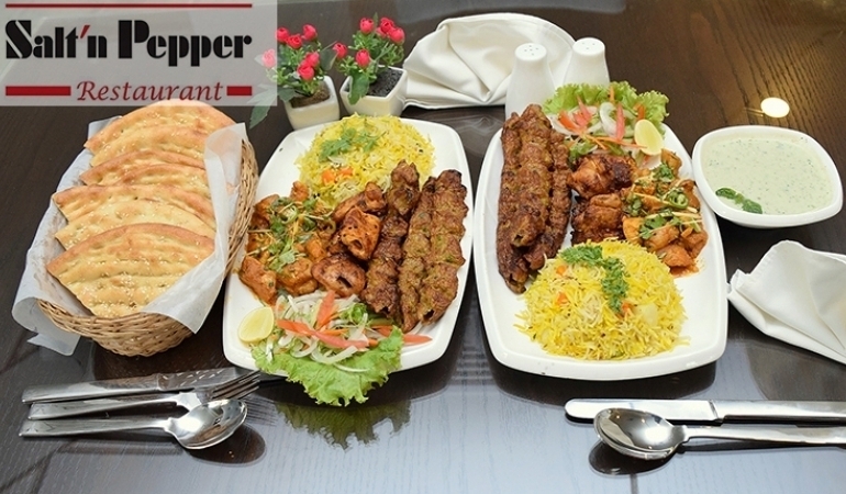 Pakistani VIP Meal For 2 Get Boneless Chicken Handi + 4 Boneless Chicken Boti + 4 pcs Chicken Seekh Kabab + Vegetable Biryani + 1 Mint Raita & Kachumar Salad +2 Nan +2 Deserts From Saltn Pepper